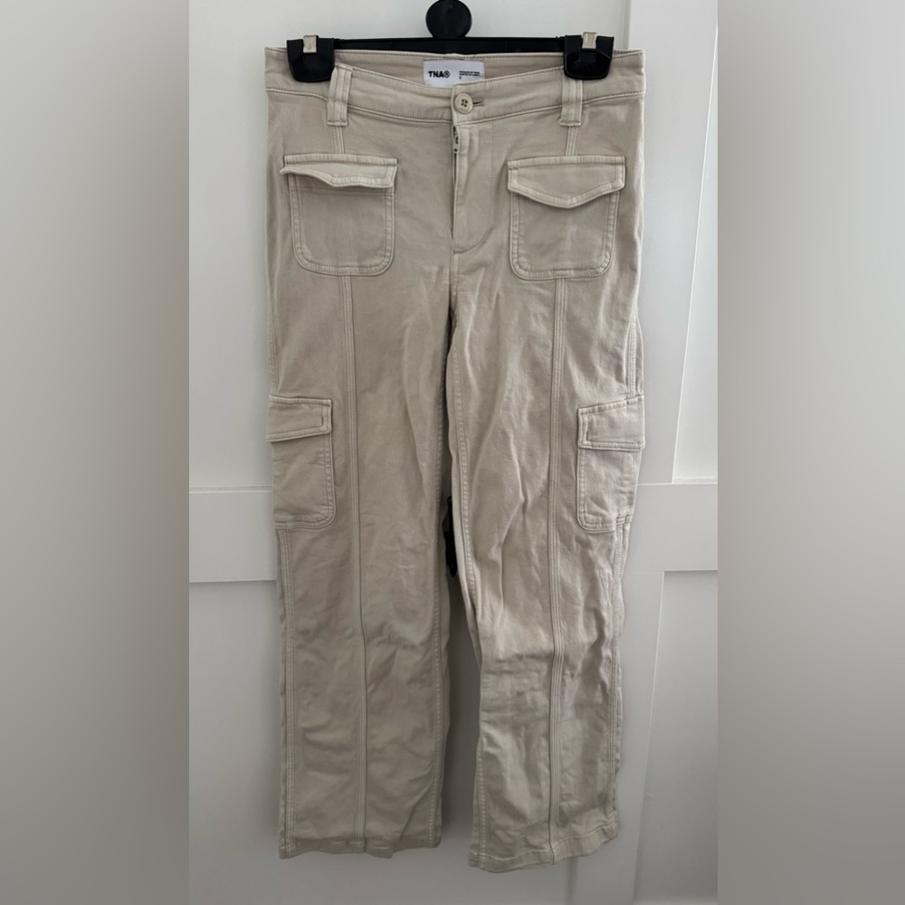 Aritzia TNA cargo pants in beige size 0.